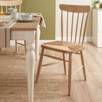 98786fa7763f3b4a29981c424c6d1066bec6a398d2f245f9cd4c634c118284c1.jpg An Image of Ariella Bar Table with Churchgate Bar Sools White