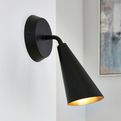 b99dd3ce4b820ec35988546fe2e61f0641daf0ee6fb7577e35698bd7a5feb076.jpg An Image of Cone Wall Light Silver