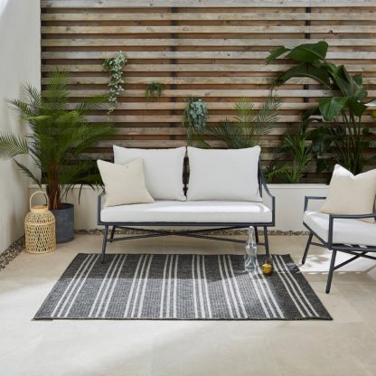 dc9d3df9d2b3cefbbf80955875dc55f615facdd17126cba420332bc7679dff4a.jpg An Image of Scandic Grey Stripe Indoor Outdoor Rug Grey