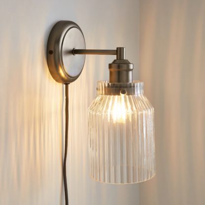 ed7cfbb60f03497b20d33077521401236d35ed0e53e218adfe49503b367d3568.jpg An Image of Tobias Easy Fit Plug In Wall Light Pewter (Grey)