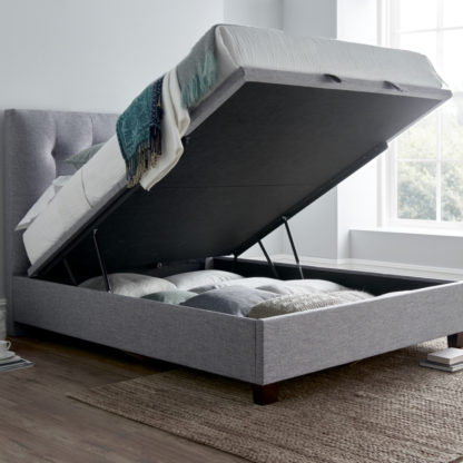 57b8afb9624f0dc0f15478b80eeaa816d5ccbd8bd32b9f12d569a9db8b390636-1.jpg An Image of Lumley - Double - Ottoman Storage Bed - Dark Grey - Fabric - 4ft6