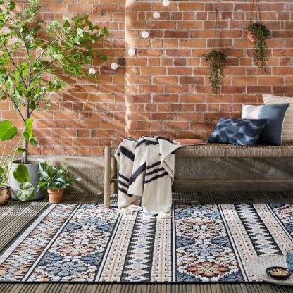 70c20679cb6f6b357dee76ad63799c8a05061d68d036aa5a8bc7f837479701a4.jpg An Image of Aster Aztec Indoor Outdoor Rug Navy