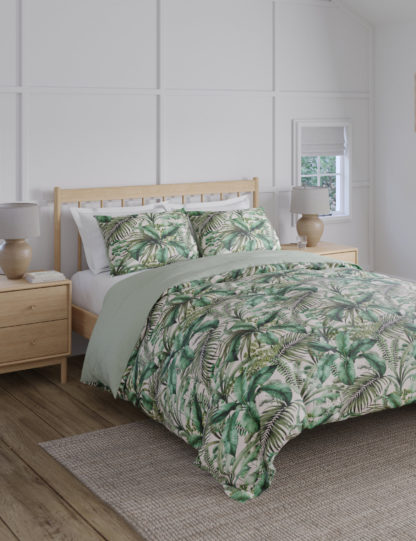 8dc677c735614ad1f384b6274cfafa5c3535510d7888a945a9bb515f54774ea8-3.jpg An Image of M&S Pure Cotton Watercolour Palm Bedding Set