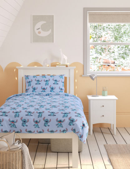 9164e76a4b4bb3663745cc655286d369f1cef8ae7a129e146bc0842e6a4ca774-1.jpg An Image of M&S Lilo & Stitch™ Cotton Blend Bedding Set
