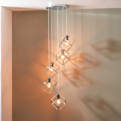 f441d80ebe32eff08f2f28b2fa974cf88e7e893916355226aca428ea9bd89b16.jpg An Image of Alessio Metal Five Cube Pendant, Nickel Nickel