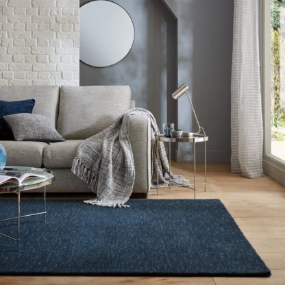 b9989d8f784d39bf04a10e6179ba612bd3828f2f7ffbf5bc50afbecec54dc657.jpg An Image of Alto Boucle Wool Rug Alto Olive