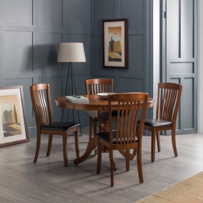 dd2aa942c2fb3521d1177f8a313e981ccfb8e4801e14b1144a0f8fdce2f6e54f.jpg An Image of Canterbury Round to Oval Dining Table with 4 Chairs, Brown Mahogany (Brown)
