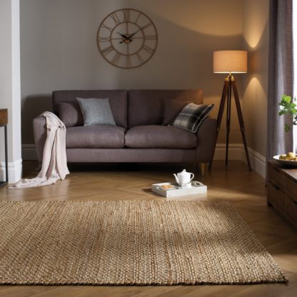 ef02b4242ec0db0137573e2f4275eaa9853548868866748591f3eafc9db6ad2d.jpg An Image of Chunky Jute Woven Rug Brown