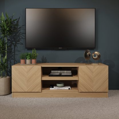 23dd1aa9eb48fd9bd088e6d6db8977c6ee6b217f3240ad3e4d2d488fc146e612.jpg An Image of Taranto Wide TV Unit Oak