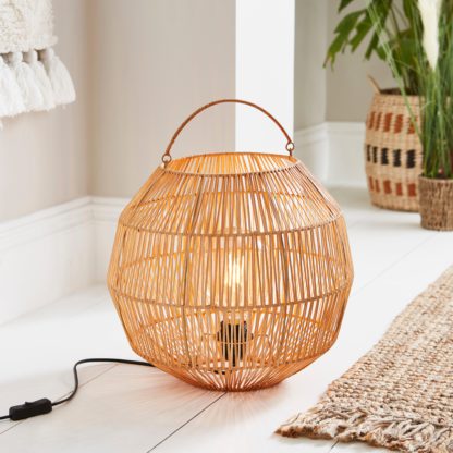 8a955d708a33861a90dde74f78847f82c4f71dcbf617beae97921dd4a0d0b8d1.jpg An Image of Wicker Woven Floor Lamp with Handle Brown