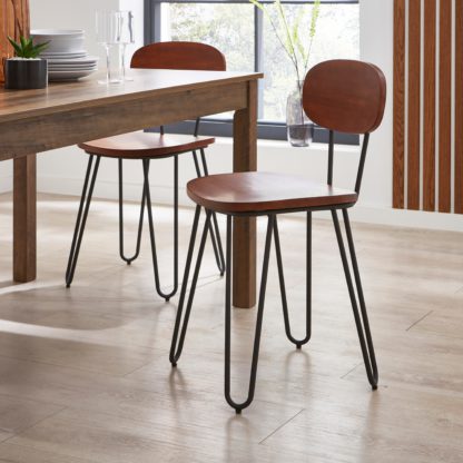 86b16a86b4ae0390d429ac1a7f56e5d932ea88b55246b62e8a3fdbb51f0271ea.jpg An Image of Torino Dining Chair Brown