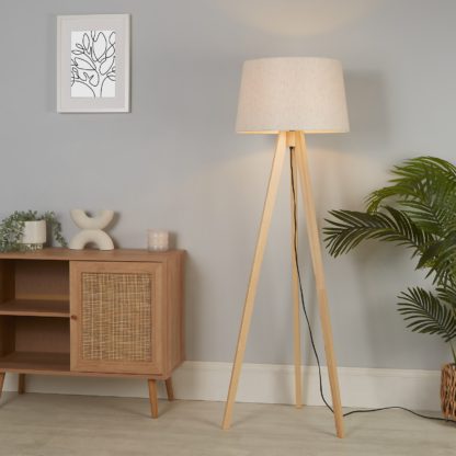 d1f98470ab98700689ecd9105ccb00895a3287ea513daac9b0438e3987ff6465.jpg An Image of The Wooden Tripod Floor Lamp