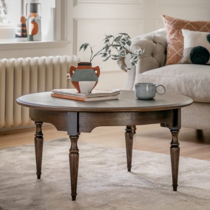 fbfbac2a8ab2ea4ab81eb60ada1a615647ec35057d191a5e07238498e53e2181.jpg An Image of Matola Dark Wood Coffee Table Matola Brown