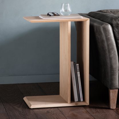 110ba4ab4e1934c17d877a85d48b7810259cce7670f656301001e9e85757d0fa.jpg An Image of Manila C-Shaped Side Table Natural