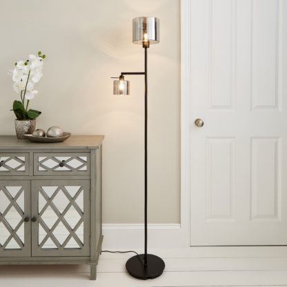 536426407d056dc2f1ec442ed5bdfca2b5a7d198c5d49e75967a2e6a75f4915c.jpg An Image of Erin Smoked Mother & Child Floor Lamp Black
