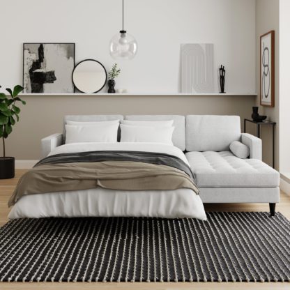 9f3700b696bb8712be1cba1c1dab787f47031639c1cb927bc585dc56ed13e9d5.jpg An Image of Zoe Boucle Storage Corner Sofa Bed Boucle Light Grey