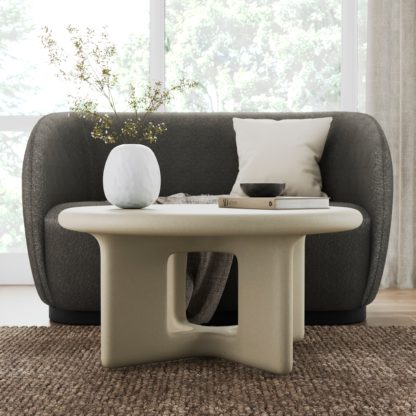d18e33cb1bb1033be5b71c0a1ab0025c44f8d8c91d8985111d0e9de18b564bb7.jpg An Image of Rue Concrete Coffee Table Cream