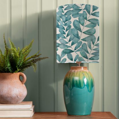 5ef541a0cad88e011461e3a3e77335b426c9ee6586293896063d89def0d73dd8.jpg An Image of Eucalypt Table Lamp with Rowan Shade Rowan Aqua Blue