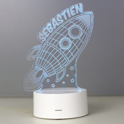 786900e0407dec6e1354ae4cf08d4adc4d90c08ab336a842de05428f937afcac.jpg An Image of Personalised Space Rocket Colour Changing Night LED Light White