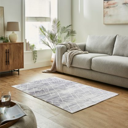 7fb5b74f3f5949330798105231f32042a6cab041931a116aed5b8951e48e3807.jpg An Image of Global Sketch Washable Rug Grey