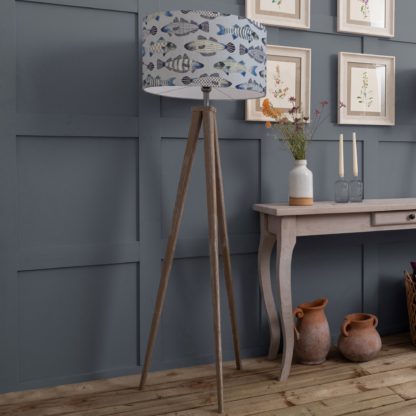 d5b797accdc0d3d79cc301eb9f11381c343110fedc7ac98e446f6525b40e1917.jpg An Image of Aratus Tripod Floor Lamp with Cove Shade Cobalt Blue