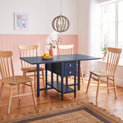 e2a4059ce6b88446dd059847bc5a83445fdc905d78ad01e529aec79e004a3b8d.jpg An Image of Pippin 6 Seater Drop Leaf Dining Table, Navy Navy