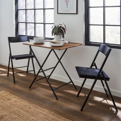 ec06b856c9954038eecc782e78f29417988e07f608814a5161cd0ecb9168c78c.jpg An Image of Freddie Folding Table Rustic Oak Effect