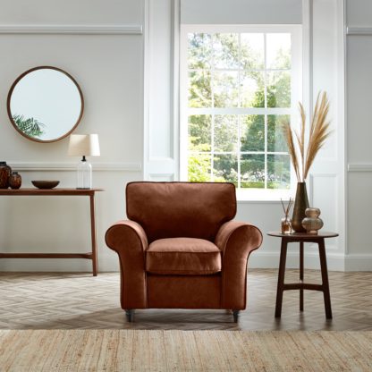 05e7b8dabc838aa9835387b90f30bee7c554190d53a3dc131c6d86fbafdd2a8b.jpg An Image of Rosa Faux Leather Armchair Soft Faux Leather Chocolate