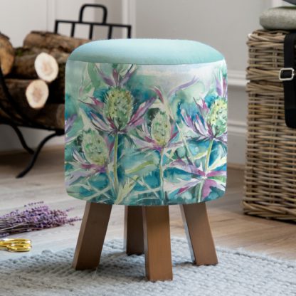 119903f60083478bc62f497b4b92df189568d7f803835f50c65761205f8a6d66.jpg An Image of Monty Fabric Footstool Monty Thistle Glen