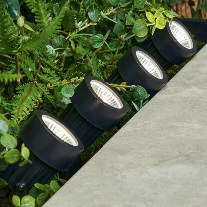 15ccaac6104fb7baaae4c32fd3992e0451bc5d3fbdd50e57541ece10b8a56197.jpg An Image of LED Outdoor Spike & Deck Lights - Pack of 4