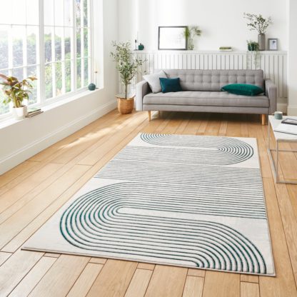 23b8a3e78da5806ccedc295a5ec05edc31e46aba3871729a44427ac293ad5a2d.jpg An Image of Apollo Swirl Washable Rug Navy (Blue)