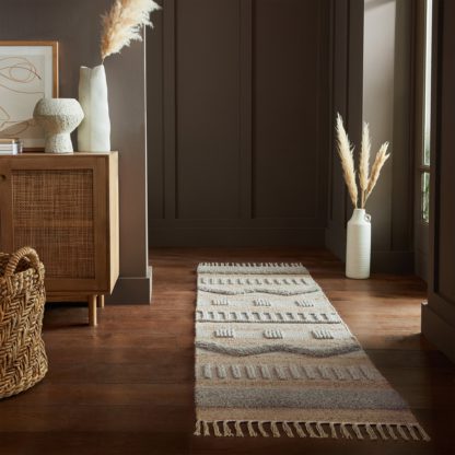 456e4f2df764c22dde7d8b289c985201b6c10f82d89a98cea4ab6f0f9429a87b.jpg An Image of Medina Jute Runner Medina Jute Grey