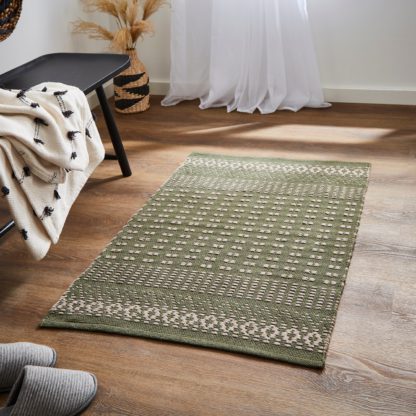 4e7850063dcfffd947080fa85e2669124ab2a7be61cb88d5392ebf2e504b71a0.jpg An Image of Woven Washable Rug Green