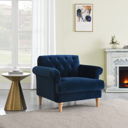 57625349d8fc1d23d36d7f7f827fe23a0e805fb10983f7a2b16f3e0afd411b1a.jpg An Image of Jazz Velvet Armchair Midnight (Blue)