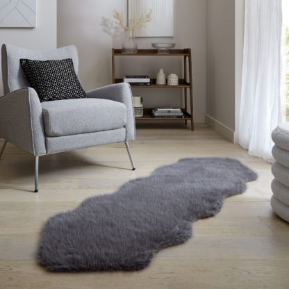 766e5795c82adca6e065d5f01400ea6bda93c22a3505177a33a94446f99c5f96.jpg An Image of Whistler Faux Fur Quad Pelt Rug Pacific Blue
