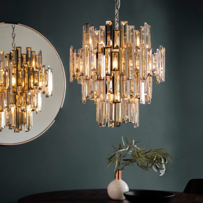 96e36c1ffa776db7c9da165ee8c9cca2a39903f494ce0224b83314939a0d9c5e.jpg An Image of Vogue Dante 12 Light Chandelier Chrome