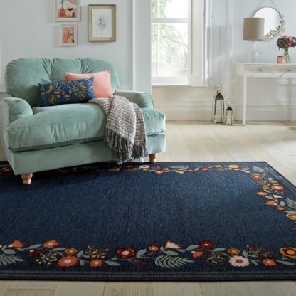 ad34e84852f318b9acdd9bfbcec2d6a28897a27155aba0a2cff9513d932c8de4.jpg An Image of Camellia Floral Border Rug Camellia Blue