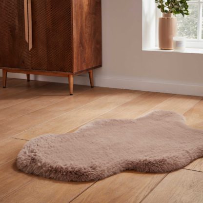 adbfffc64c8ff45063b1673ad693b7a4d7e19b0984c8d6fc36eb7b559528c22e.jpg An Image of Super Teddy Sheepskin Rug Pink