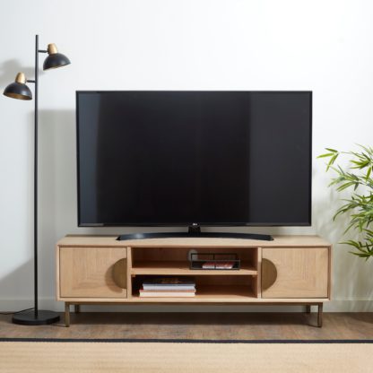 d006e2f732783f5aa7d54de86b68468be8977ba0f66141eaeeefe28372058b49.jpg An Image of Agatha Wide Oak TV Unit Natural
