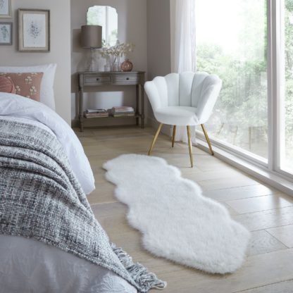 e26fe53a91ab9d96cf1fbb68c747cb2f8b0a1ef68495c6b4234f522249abd3aa.jpg An Image of Whistler Faux Fur Quad Pelt Rug Pacific Blue