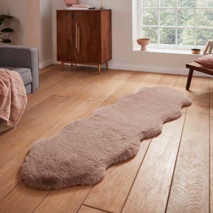 fa5e9d4c4c9c58048732ffc00f943cee3e36ba55629b0040beee5fce73df7b1e.jpg An Image of Super Teddy Sheepskin Rug Pink