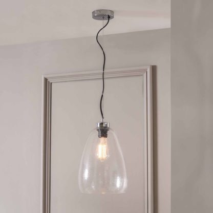 85e763cbf40b178545ad3ff9712d77d2647625b901ab977f2e2951c8073bfee6.jpg An Image of Beja Organic Shape Tall Bubble Glass Pendant Clear