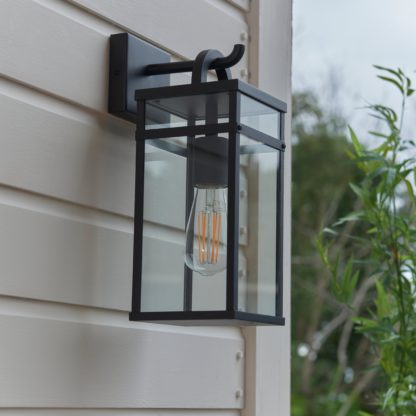 c2f0df9c4cdc554f4f98079c4d0d004ffb3cc0329e0971f366c3d6c864a3e0bd.jpg An Image of Dalton Industrial Indoor Outdoor Wall Light Black