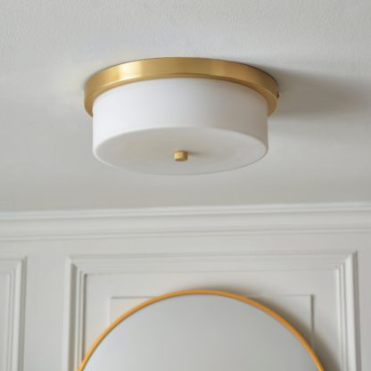 cbbf1cfaa8c9cac8e33e8b194b42bb2960cfb42f2d7e62823fb82a9086307418.jpg An Image of Roan Dimmable Bathroom Flush Ceiling Light Gold