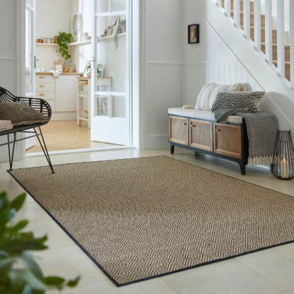 dc44ff45d6df85cbdcbb560ea972de160b6da6bfb86ff9f720c68892443349b8.jpg An Image of Diamond Jute Border Rug Black