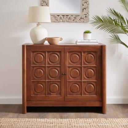 dd9ccf17eeea7f5e04844821bd07fc41f766e20ee73cc65393dd80230b6faa11.jpg An Image of Theodore Small Sideboard Whitewashed Wood