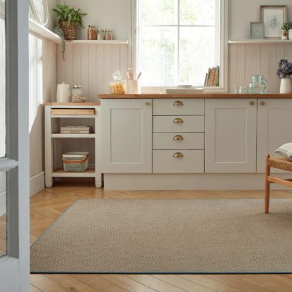 eddf469006686377e53b49a8cb9eb0ac6e68d65fda6e8dfa11332740ca9a1394.jpg An Image of Diamond Jute Border Rug Black