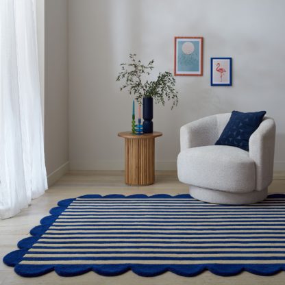 fd5bcc1bf8f03b6384651cabfa25c347cec144fe45cf53fd4caebc2e2f31301d.jpg An Image of Milo Scallop Blue Wool Rug Milo Blue