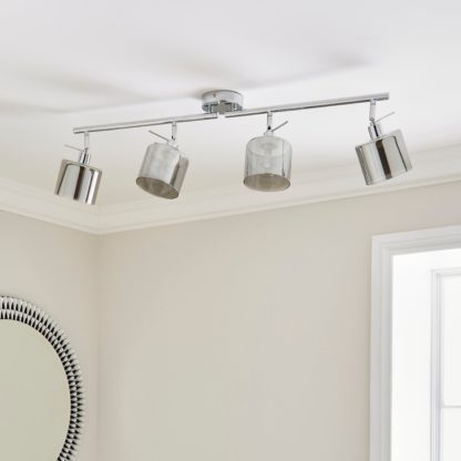 280bebf25632e6dd88164a77d288b4373616a02fd99a086aabf1f9cea3583b60.jpg An Image of Erin 4 Light Adjustable Spotlight Bar Silver