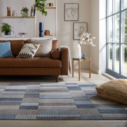 c41de2ed517c3c9c3752f768827a64e4e23f524c0d43da814f1255cb61d9c27f.jpg An Image of Fuse Offset Striped Rug Blue